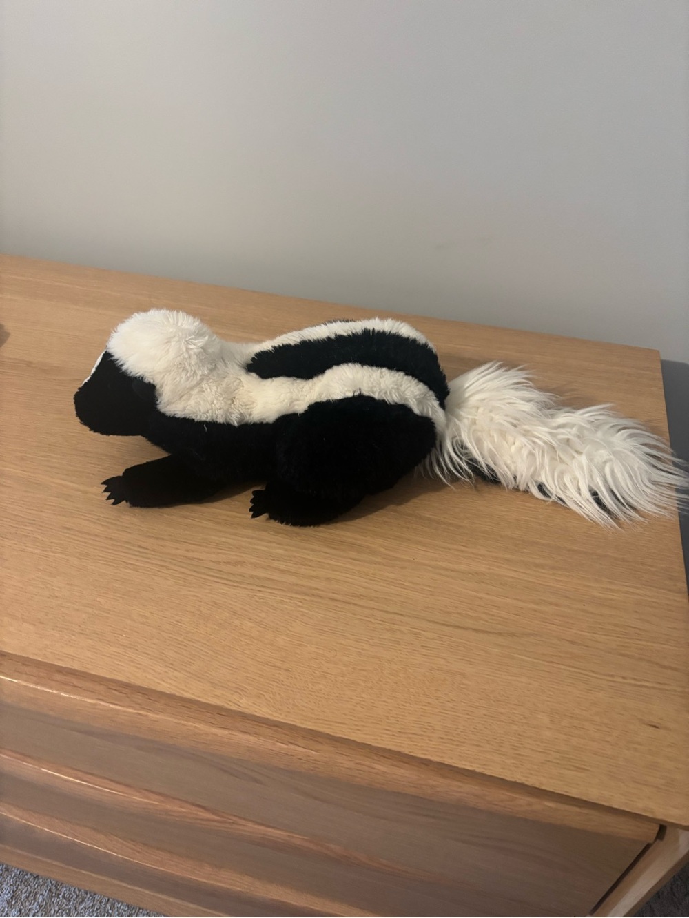Skunk hand puppet